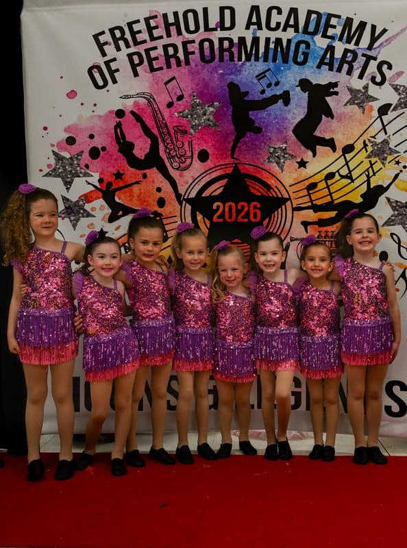 A class in pink sequin costumes