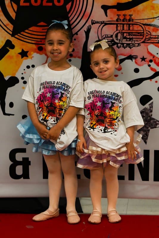 Two young dancers in FAPA t-shirts
